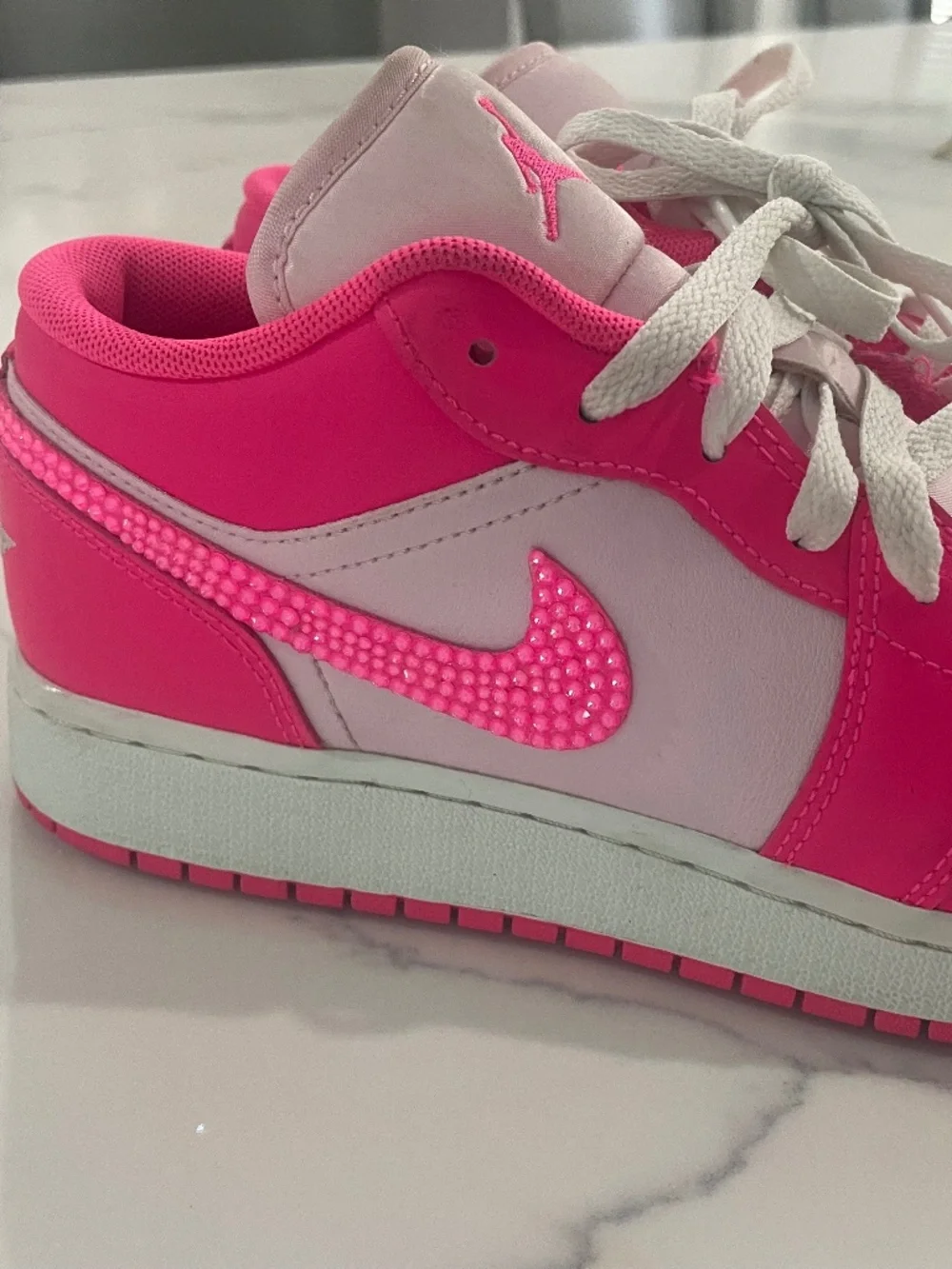 Pink custom embellished Nike dunks